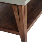 Tavolino con piano rivestito in cemento e legno chiaro